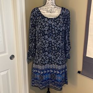 Blue print mini dress with black lining
